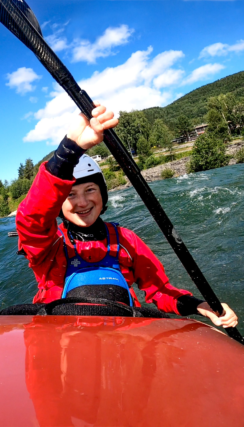 Whitewater kayaking on waves of the Sjoa Playrun section in Norway, GoPro shot.