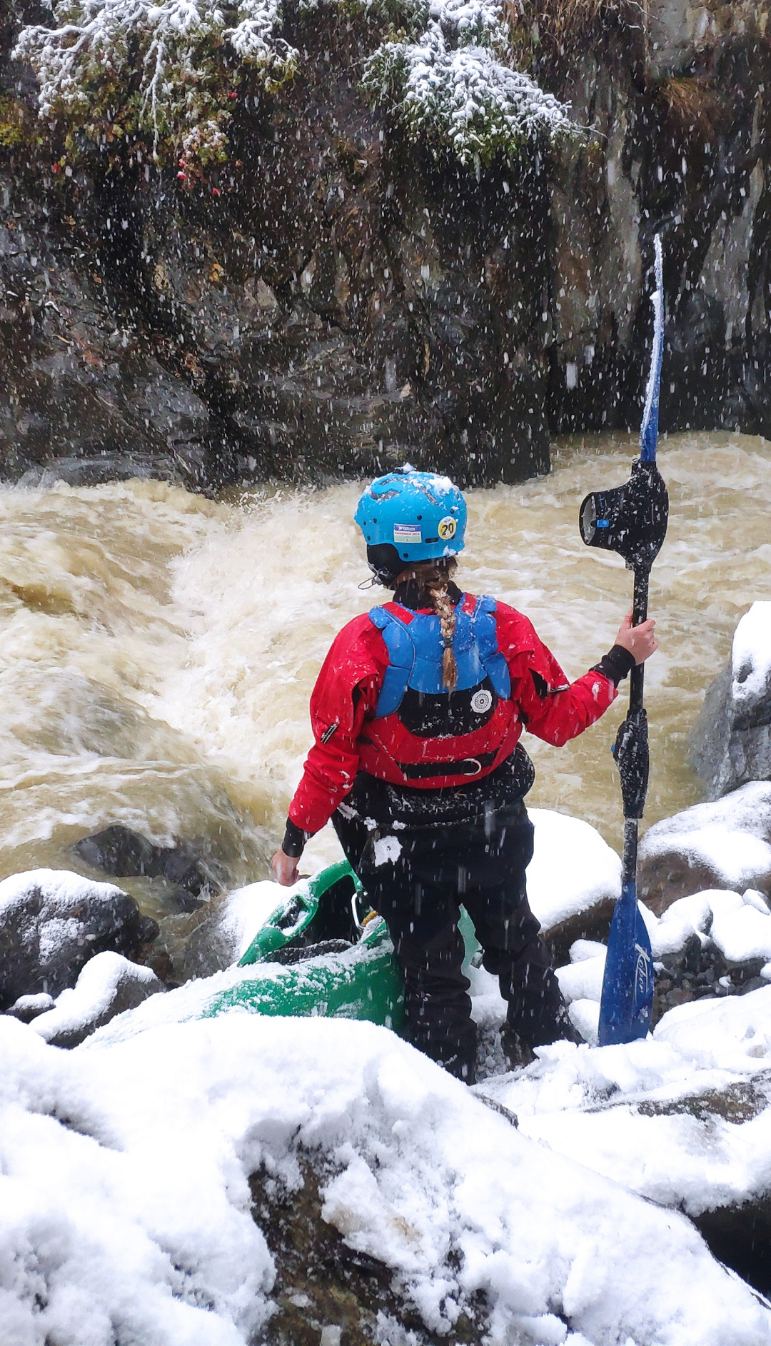 Snowy day whitewater kayaking, Venter, Austria.